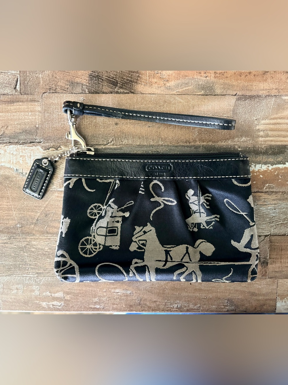 Coach Black Wristlet with Cream Signature Horse & Carriage Print